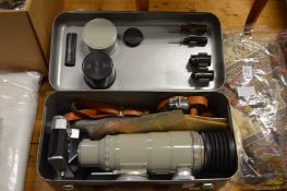 A Photosniper cased lens set, fitted with a Zenit ES camera.