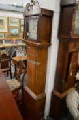 An oak longcase clock with thirty hour movement, the painted square dial signed Charles Haines,