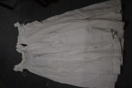 Two early lace christening gowns.