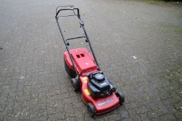 A Mountfield petrol rotary lawn mower.