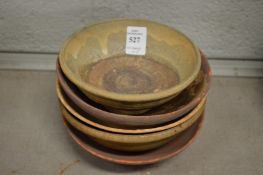 Five Chinese terracotta bowls.