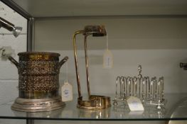 Plated items to include a soda syphon holder, a bottle holder and a six division toast rack.