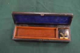 A leather cased travelling writing set.