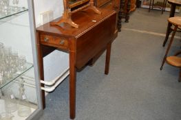 A small mahogany Pembroke table.