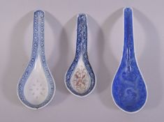 THREE CHINESE PORCELAIN SPOONS, various styles, largest 15cm long.