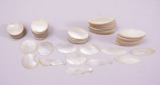 A LARGE COLLECTION OF 19TH CENTURY CHINESE ENGRAVED MOTHER OF PEARL TOKENS, of various shapes and