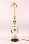 A GOOD CHINESE FAMILLE VERTE PORCELAIN LAMP / VASE, the vase painted with figures and floral motifs,