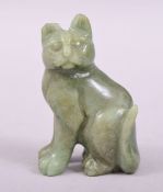 A CHINESE GREEN HARDSTONE / JADEITE FIGURE OF A CAT, 6.5cm high.