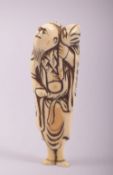 AN 18TH CENTURY CARVED IVORY SASHI NETSUKE of a sage, 10cm long.