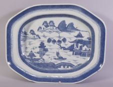 A CHINESE BLUE AND WHITE PORCELAIN CARVING DISH, decorated with landscape scene, the centre with