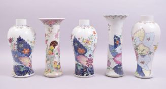 FIVE CHINESE FAMILLE ROSE PORCELAIN VASES, each painted with colourful floral sprays, various