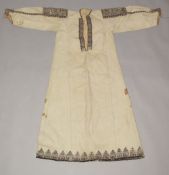 A 19TH CENTURY PALESTINIAN DRESS, with decorative embroidered panels to shoulders.