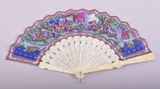 A VERY GOOD CHINESE CANTON CARVED IVORY FAN in original case, the fan opening to reveal a