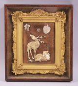A FINE JAPANESE SMALL GILT FRAMED SHIBIYAMA PICTURE, depicting two deer and mother of pearl