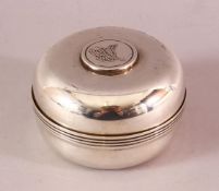 A WHITE METAL INSET CALLIGRAPHIC COIN CYLINDRICAL BOX AND COVER, the top with in inlaid coin with