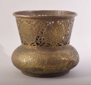 A GOOD ISLAMIC DAMASCUS ENGRAVED OPENWORK BRASS SHALLOW VASE, the body with a band of profusely