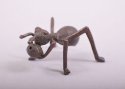 A JAPANESE BRONZE MODEL OF AN ANT, 5cm long.