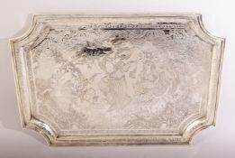 A GOOD PERSIAN ENGRAVED WHITE METAL TRAY, the centre depicting a dancer and musicians surrounded