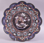 A JAPANESE CLOISONNE PETAL FORMED DISH, the centre with a roundel containing a stylised cockerel,
