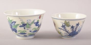 TWO CHINESE PORCELAIN DOUCAI CUPS, one painted with playing boys and with six character mark to