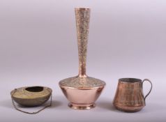 THREE PIECES OF EASTERN METALWARE, comprising of a tall neck copper vase with embossed and chased