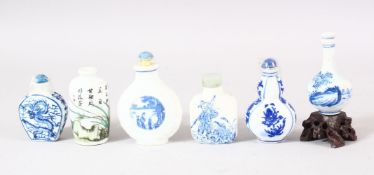 A MIXED LOT OF 6 CHINESE BLUE & WHITE PORCELAIN SNUFF BOTTLES - each with varying decorations,