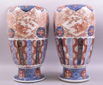 A GOOD LARGE PAIR OF JAPANESE IMARI PORCELAIN VASES, the body of each decorated in the imari palette
