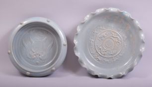 TWO CHINESE CELADON BRUSH WASHERS, one with moulded decoration to centre depicting animals, 23cm