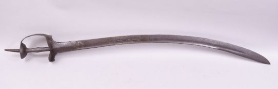 A 17TH CENTURY INDIAN FIRANGI SWORD, the curving blade measuring 75cm long, overall 95cm long.