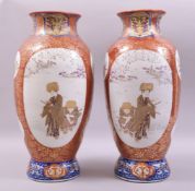 A LARGE PAIR OF JAPANESE IMARI PORCELAIN VASES, the body of each with two large panels depicting