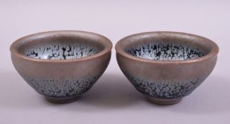 A PAIR OF SMALL CHINESE OIL SPOT GLAZE POTTERY BOWLS, 9cm diameter.