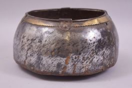 A 12TH/13TH CENTURY AYYUBID STEEL BOWL, with brass rim, engraved panels, (age related wear), 21cm