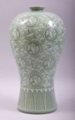 A LARGE KOREAN CELADON GLAZE PORCELAIN VASE, decorated with roundels of cranes, mark to base, 36cm