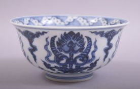 A CHINESE BLUE AND WHITE PORCELAIN BOWL, the interior of the bowl painted with tibetan script, the