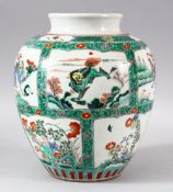 A CHINESE KANGXI STYLE FAMILLE VERTE PORCELAIN JAR - decorated with panels of animals and flora -