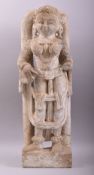 AN EARLY INDIAN CARVED STONE STATUE OF A FEMALE holding a musical instrument, 66cm high.