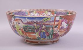 A LARGE CHINESE MANDARIN FAMILLE ROSE AND IRON RED PORCELAIN BOWL, painted with panels of figures in
