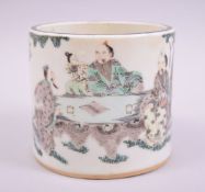 A CHINESE FAMILLE VERTE PORCELAIN BRUSH POT, painted with figures, 11cm high.