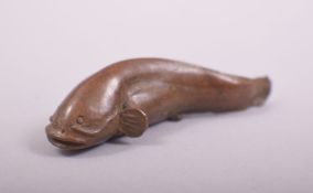 A JAPANESE BRONZE MODEL OF A FISH, stamped underside, 6cm long.