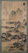 A CHINESE SCROLL PAINTING OF A MOUNTAINOUS LANDSCAPE, with script to top left, seal mark to top