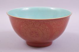 A CHINESE CORAL RED AND TURQUOISE GLAZED PORCELAIN BOWL, the exterior decorated in gilt with