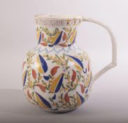 AN IZNIK STYLE ITALIAN CANTAGALLI GLAZED POTTERY WATER JUG, painted with stylised leaves and vine,