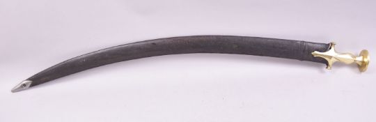 AN INDIAN BRASS HILTED TULWAR SWORD, and scabbard, overall 82cm long.