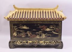 A 19TH CENTURY LACQUER PAGODA FORM CASKET AND COVER, the casket painted with gilt landscape scenes