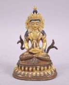 A SMALL 20TH CENTURY TIBETAN GILDED BRONZE BUDDHA, 10cm.