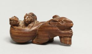 A CARVED WOOD MICE NETSUKE