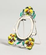 A SMALL SILVER AND ENAMEL PHOTOGRAPH FRAME.