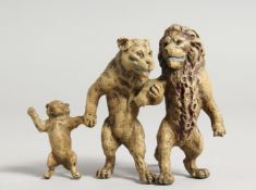A PAINTED COLDCAST BRONZE LION FAMILY. 3ins