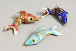 THREE ENAMEL FLEXIBLE FISH.