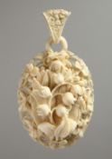 A 19TH CENTURY EUROPEAN IVORY LOCKET, 2.25ins x 2ins, carved with lily of the valley and other